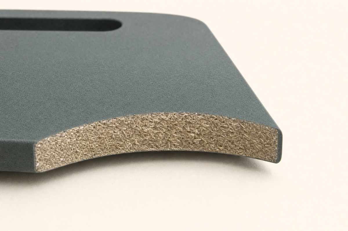 Pine fibre, food-safe resin, pressed.